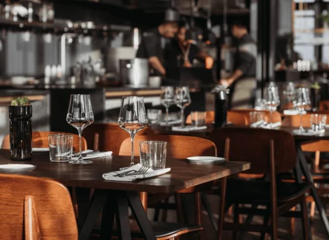 A restaurant table set for dinner